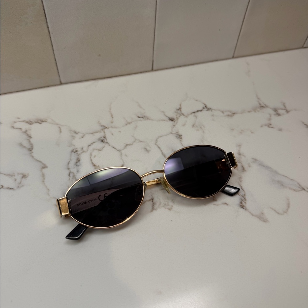 Gold Oval Frame Sunglasses with Black Lenses